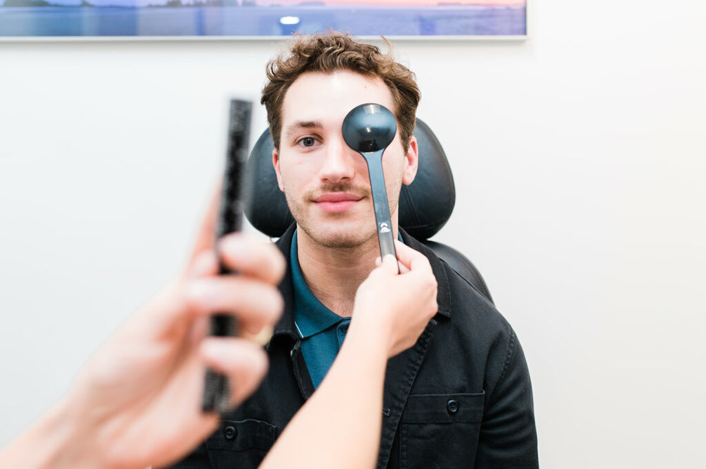 young man gets an eye test at a Kamloops eye clinic