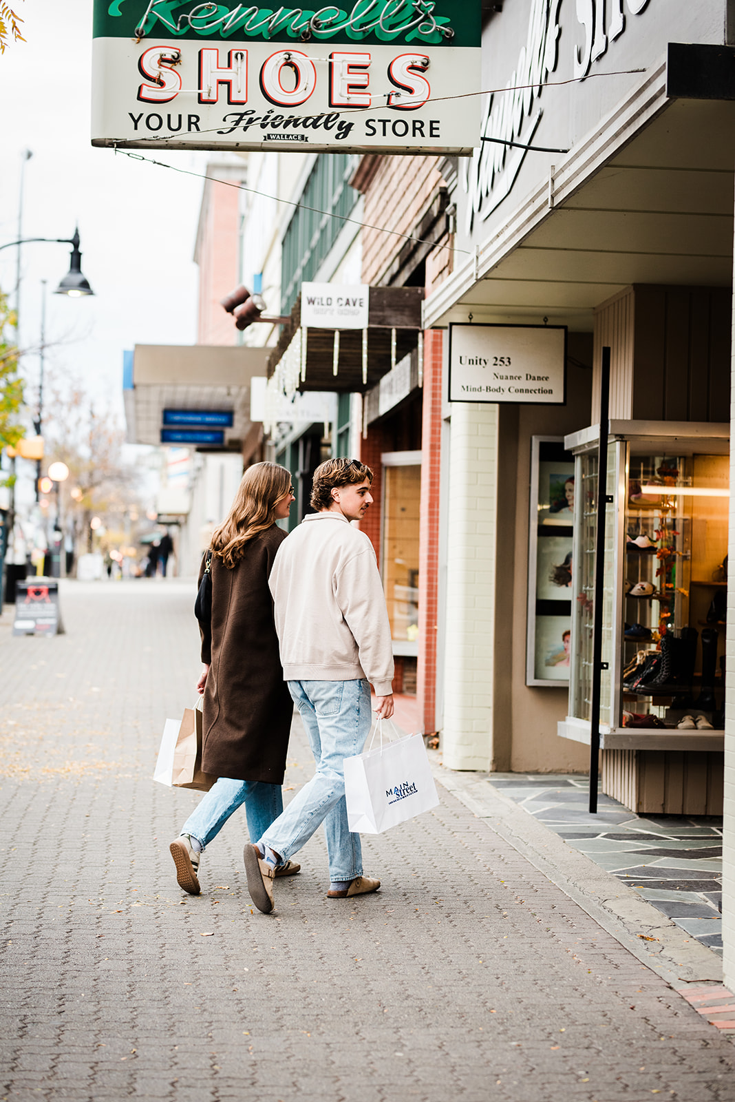 Couple wearing Nicola Eye Care glasses in Downtown Kamloops