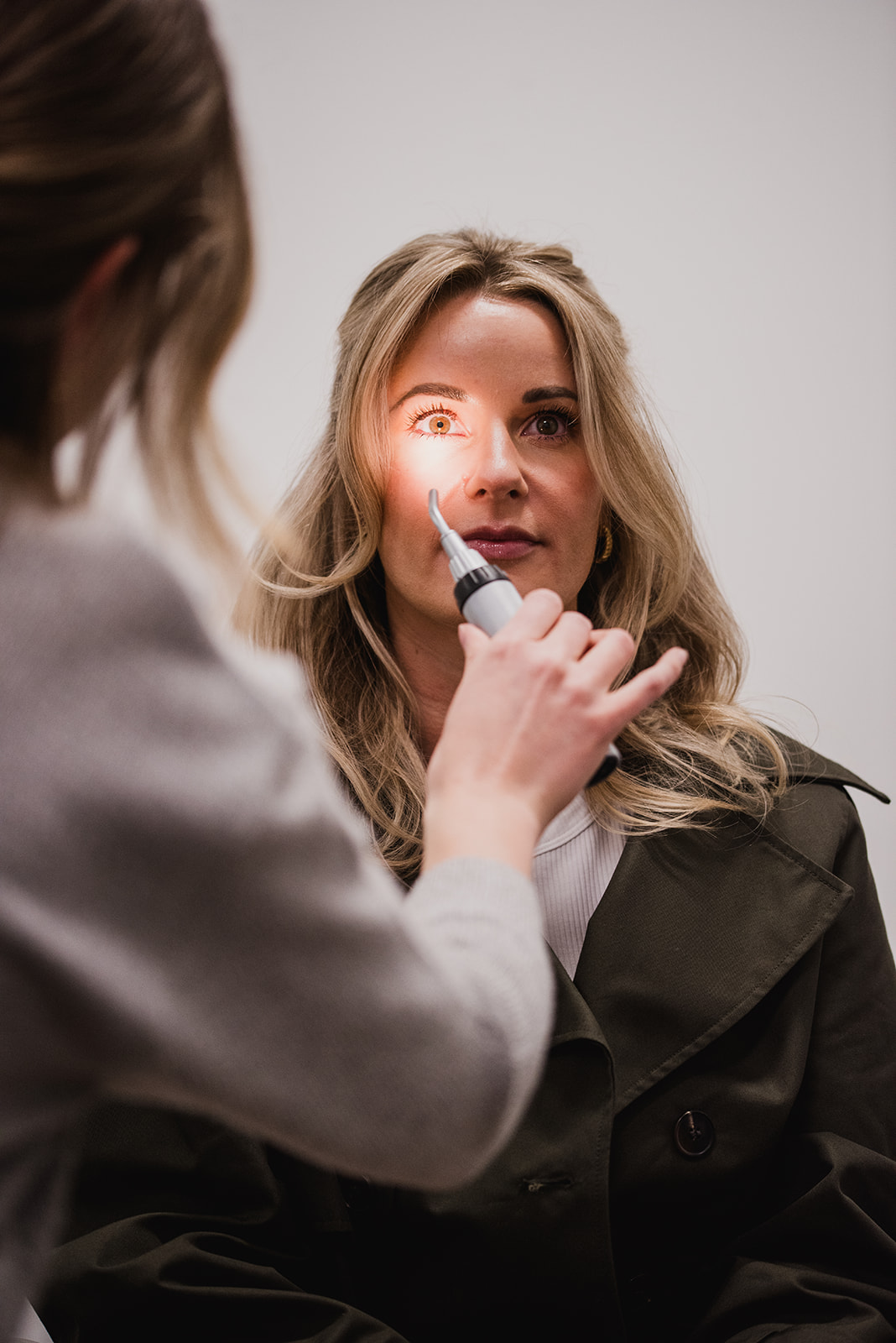 A woman getting her eyes examined