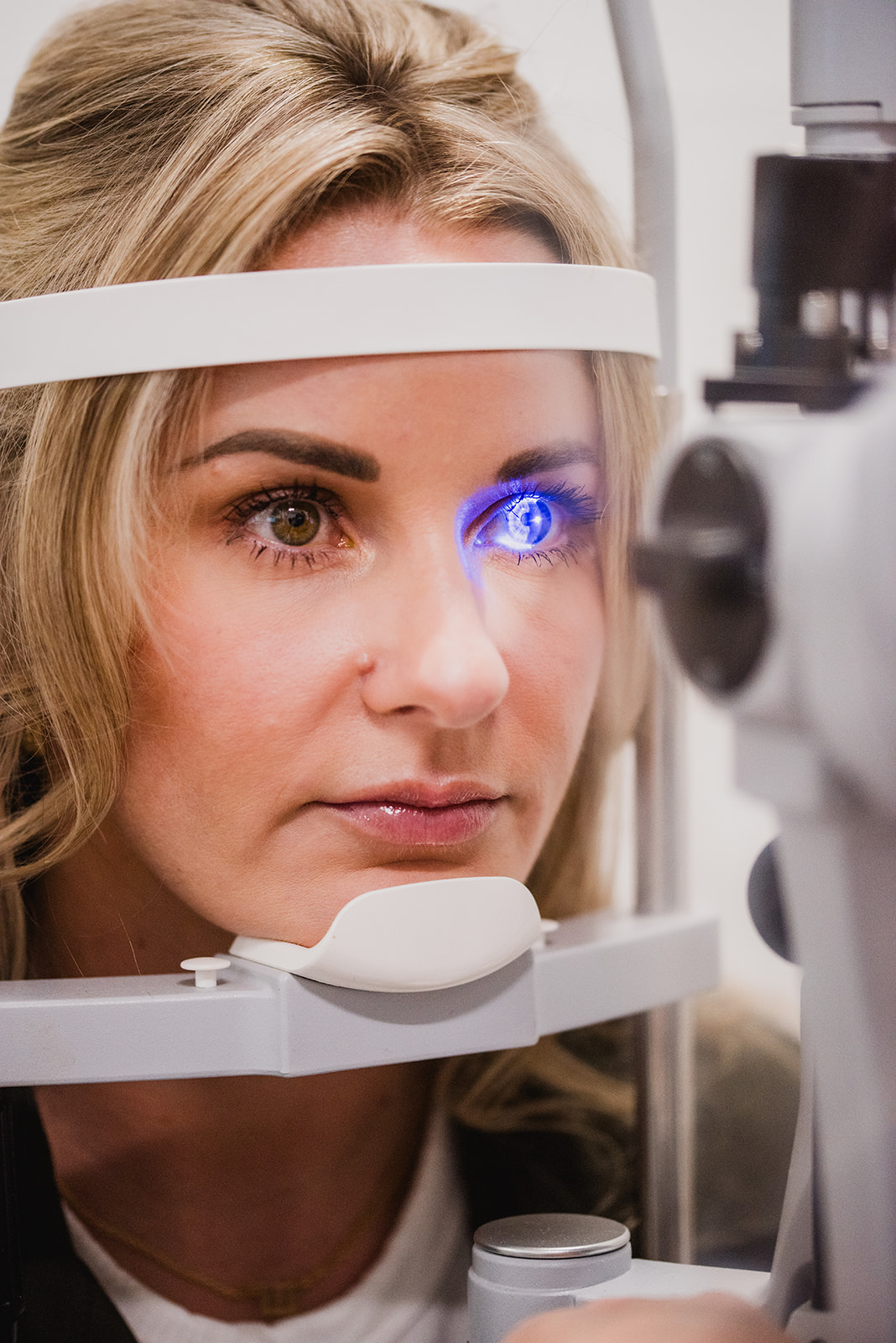 A woman getting her eyes examined