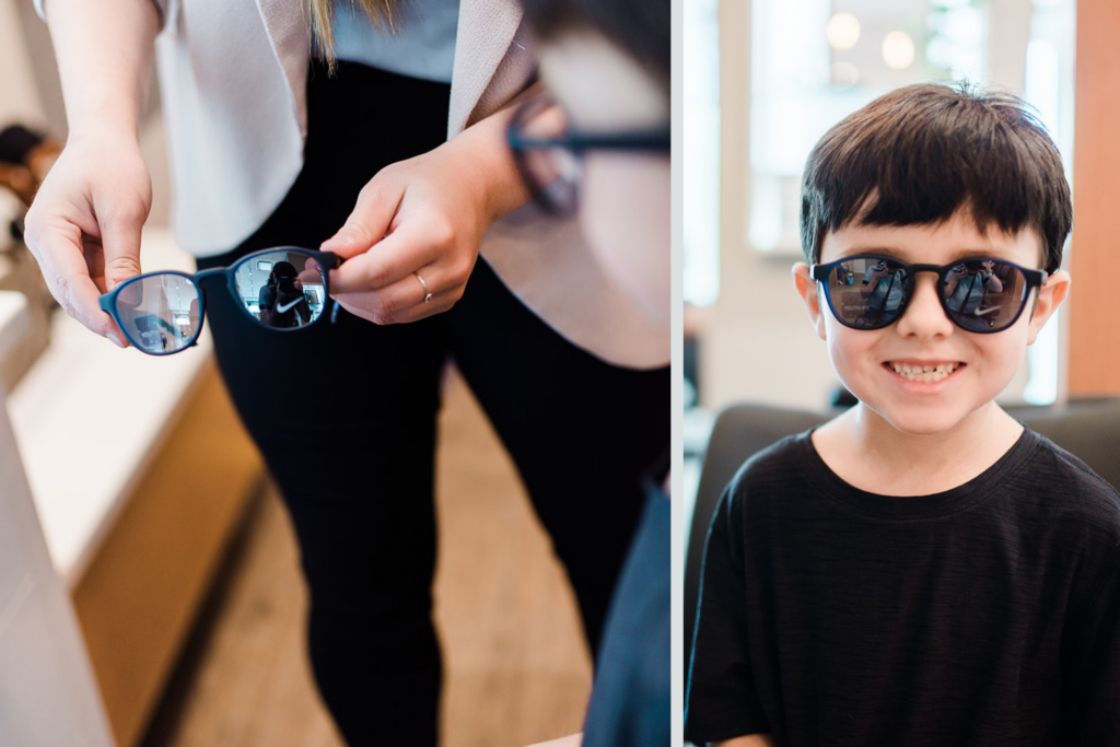 A child trying on glasses frames at Nicola Eye Care's optical boutique in Kamloops